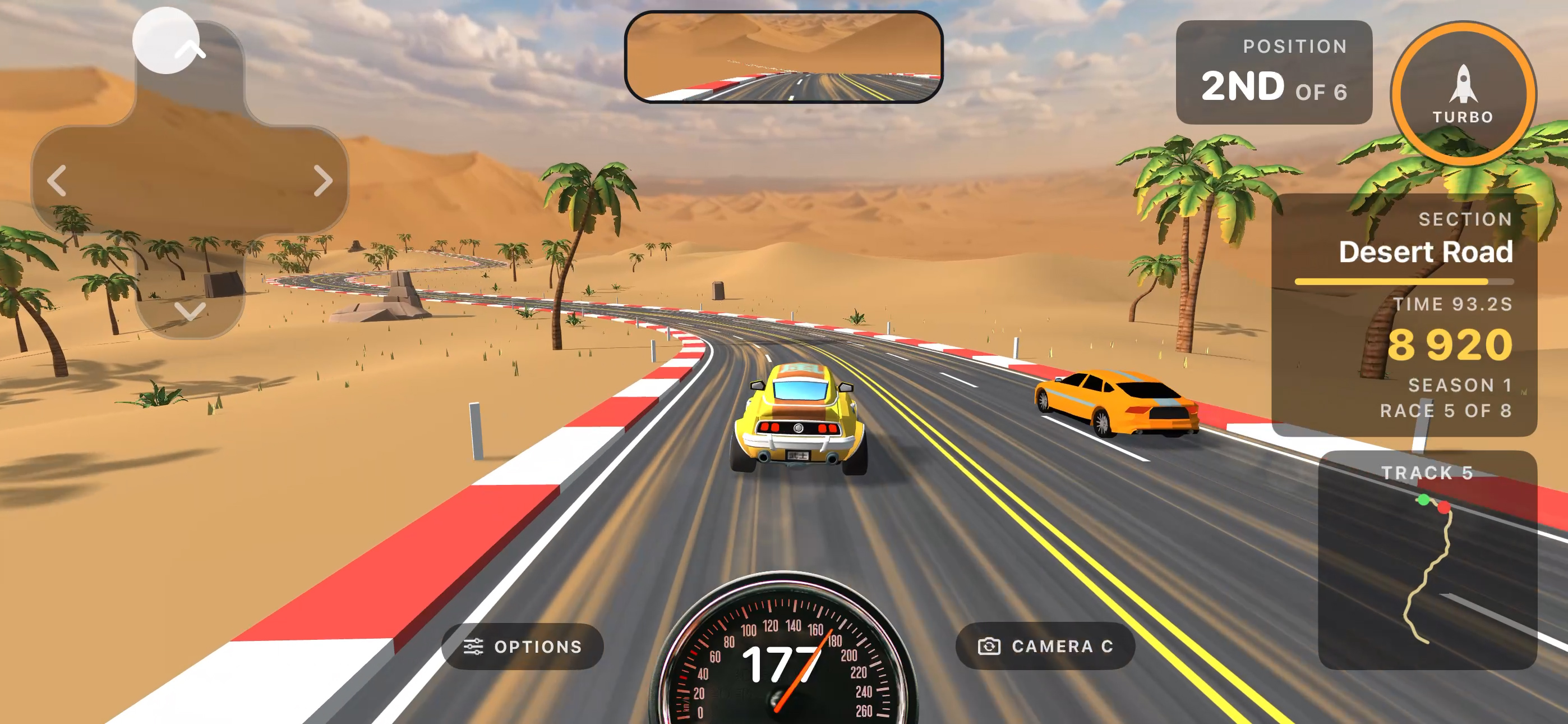 Chasing a rival along a palm-lined Desert Road